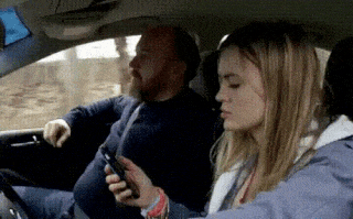 de697704-texting-and-driving.gif